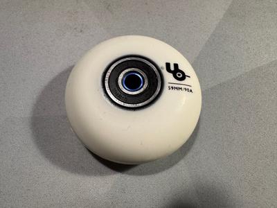 A wheel with both bearings installed, with the spacer barely showing.